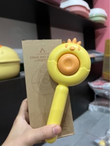 Lược chải lông nút bấm hình gà